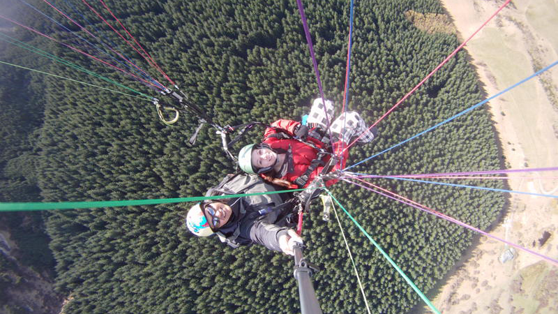 Your adventure begins with just a couple of steps forward down a gentle incline. Before you know it the earth below you gently gives way and you are suspended, gently gliding, in an adventurous new world! You are experiencing the freedom of the world of flight with Fly Paragliding!